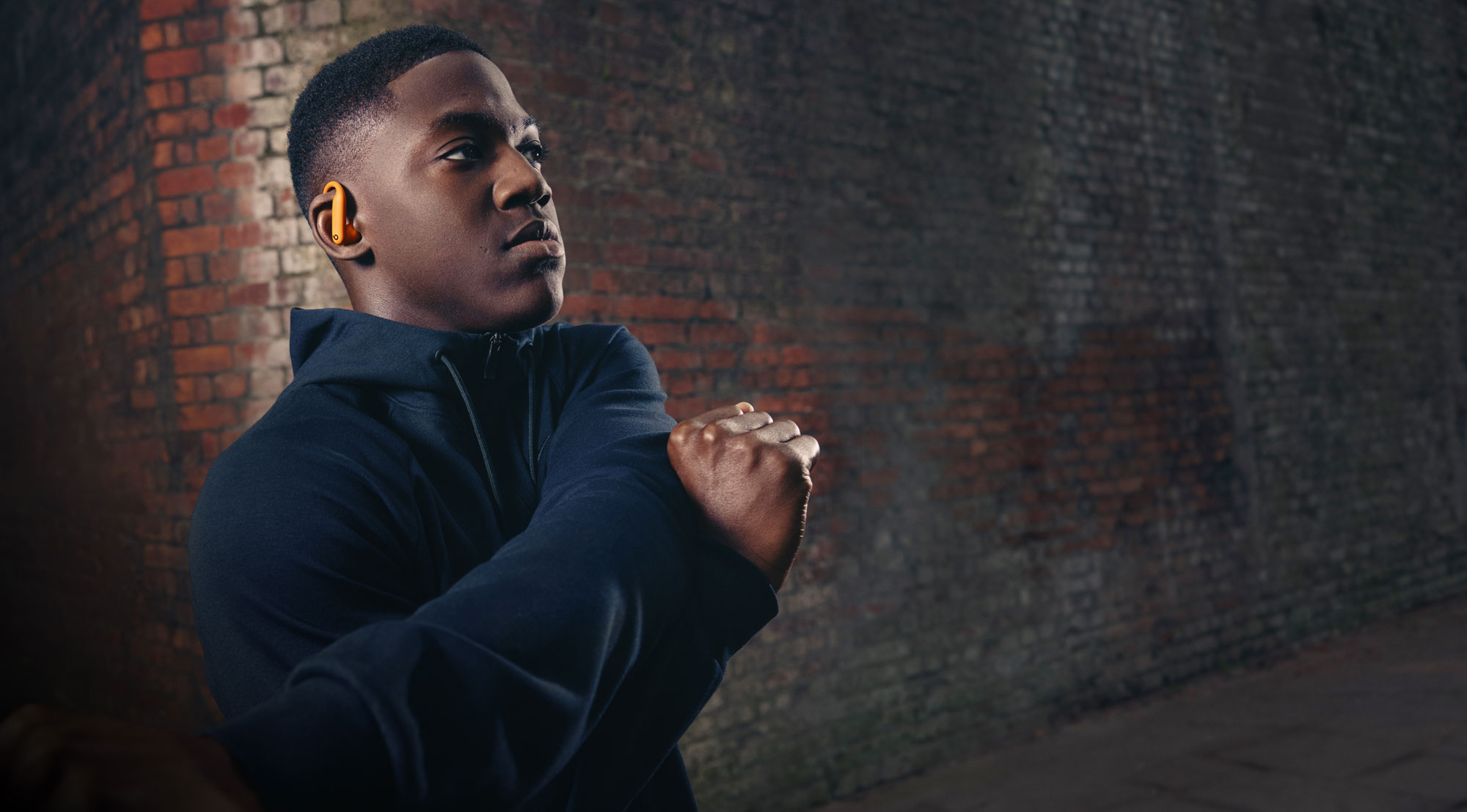 Kobbie Mainoo wearing Powerbeats Pro 2 earbuds for training