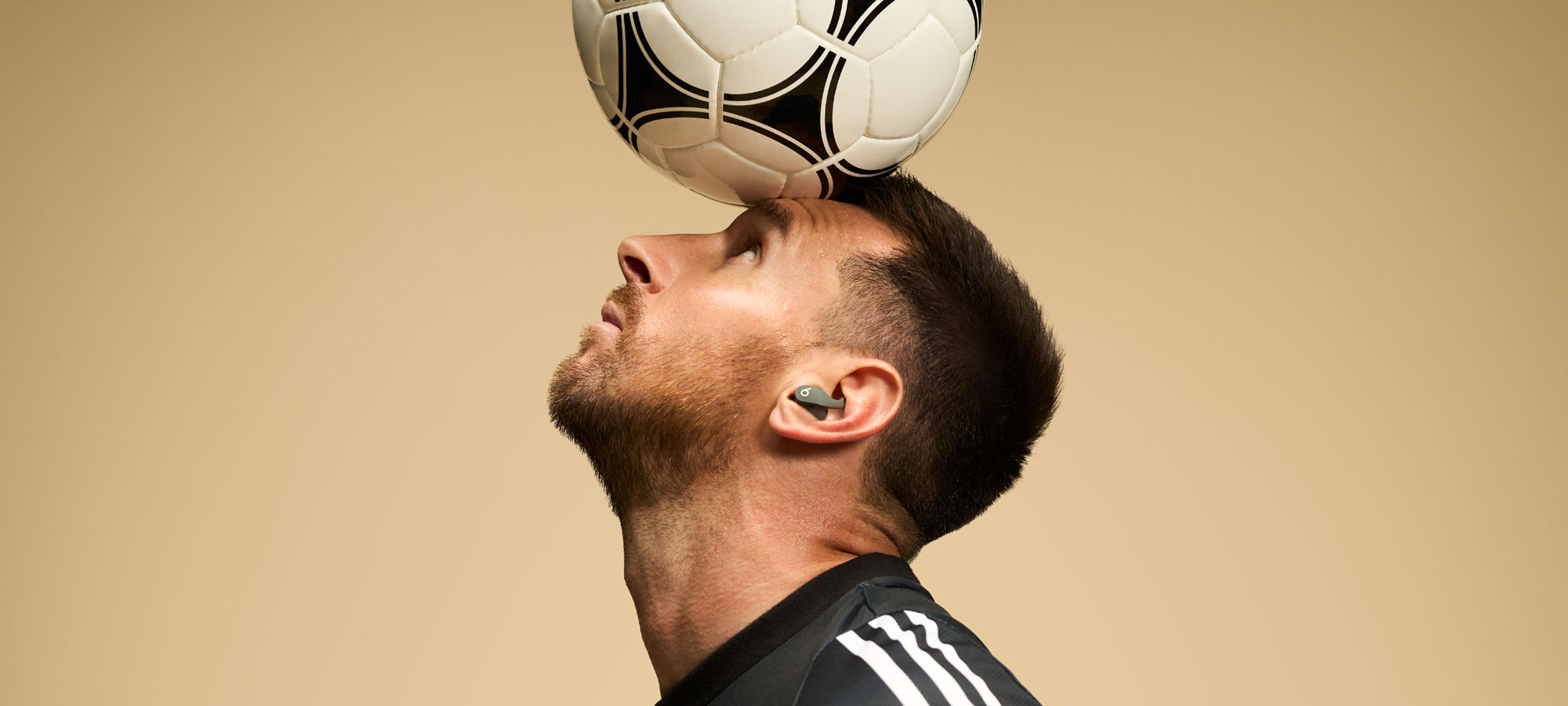 Lionel Messi wearing Beats Fit Pro